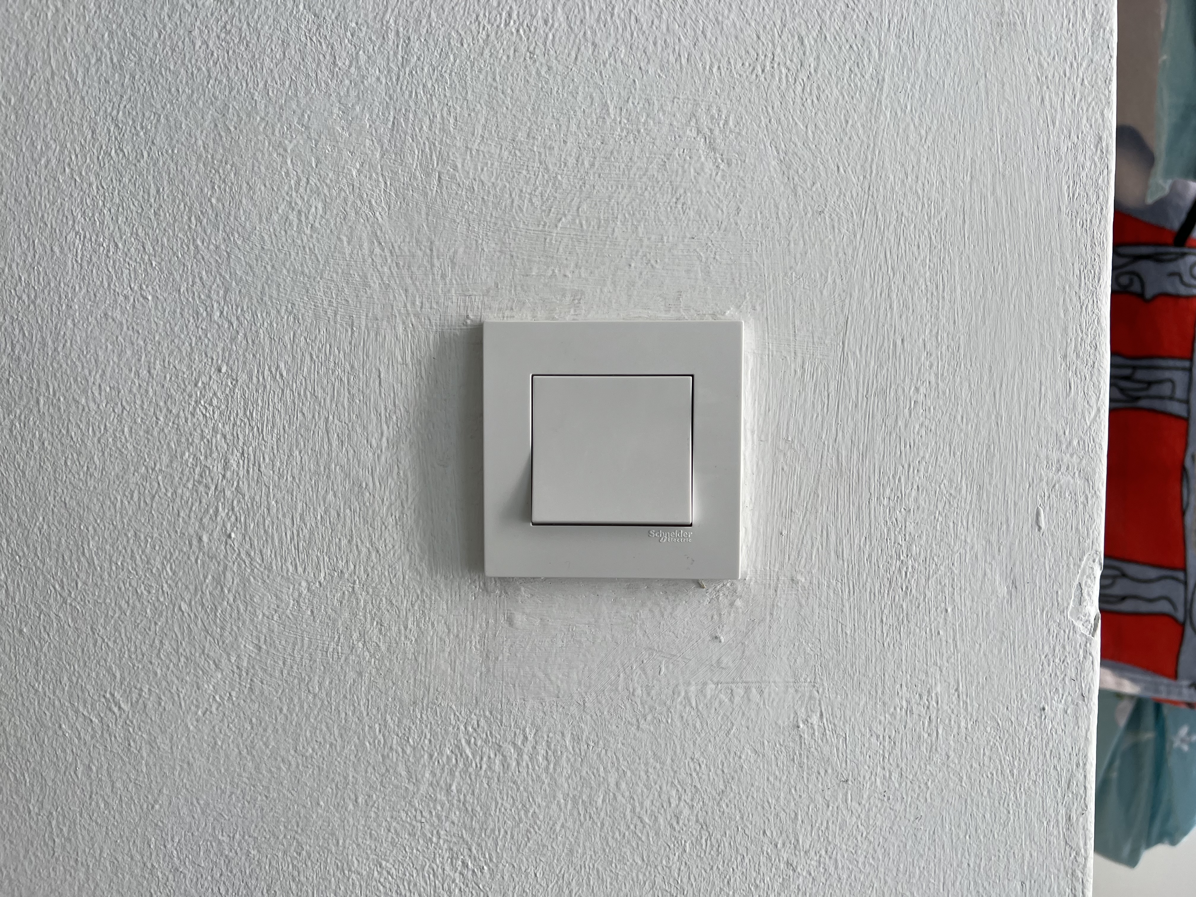 A simple one-gang light switch that we replaced